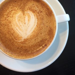 Photo of a latte in a mug at the Angry Catfish.