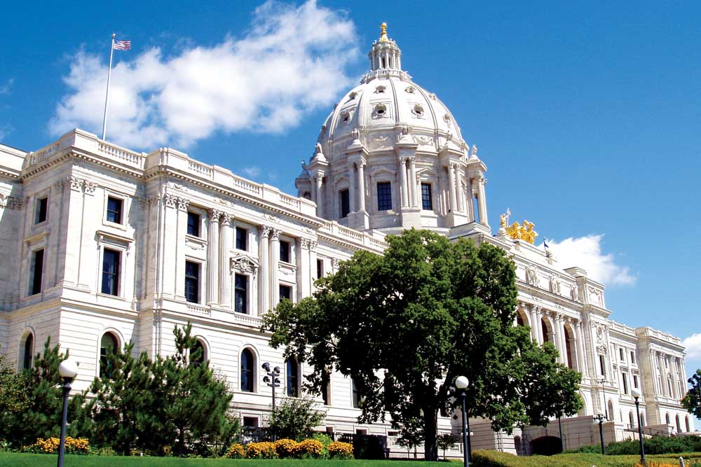 The facade of the Minnesota State Capitol on a sunny day. One of the many stops one can walk to from the Metro Transit Green Line.