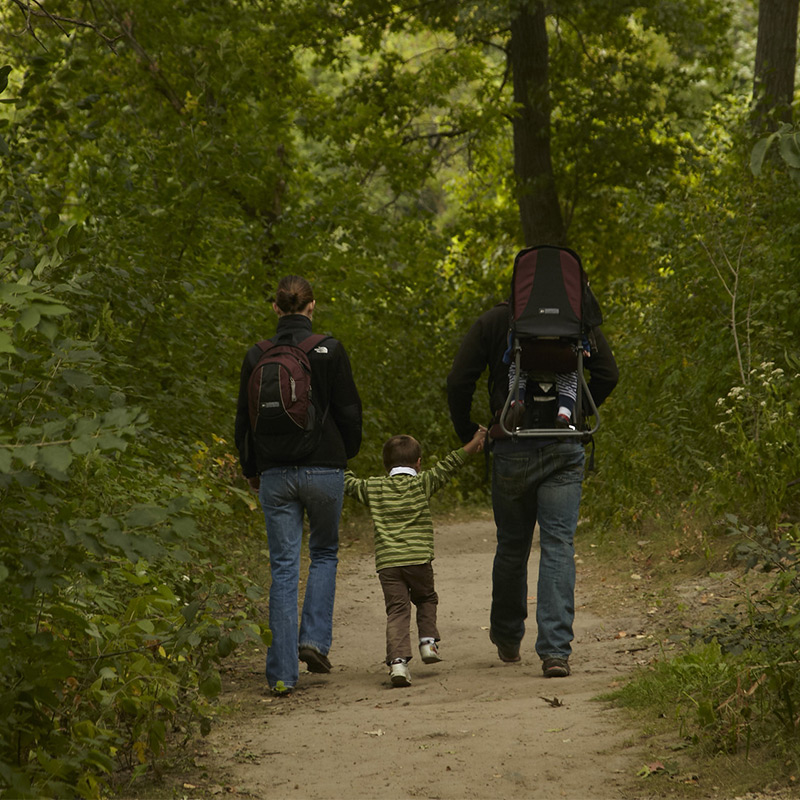 Couple hiking with child in the Twin Cities
