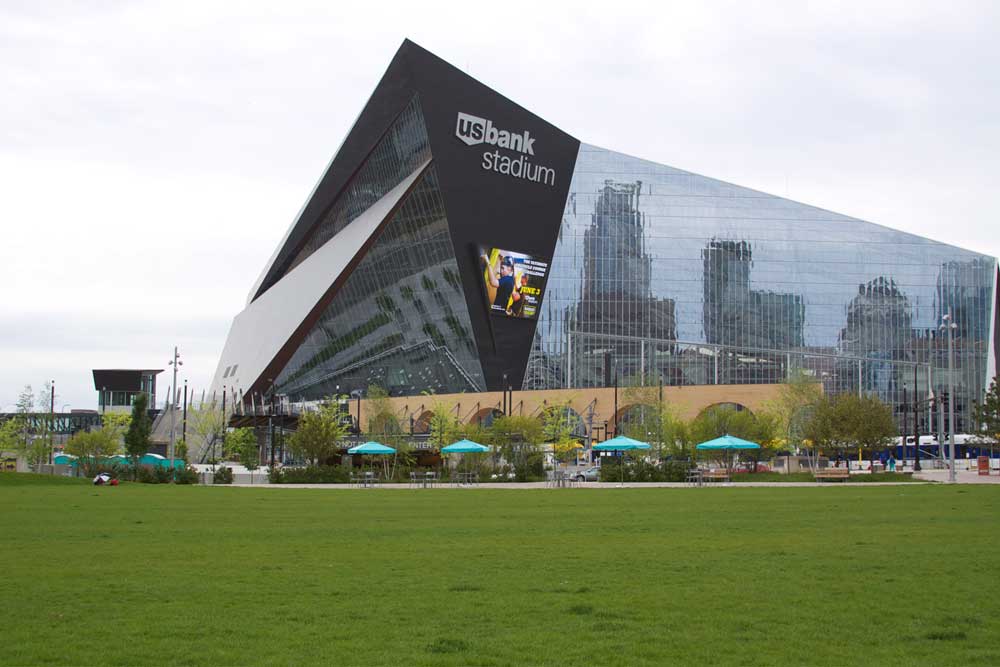 The Great Lawn at Downtown East Commons in downtown Minneapolis with U.S. Bank stadium in the background.