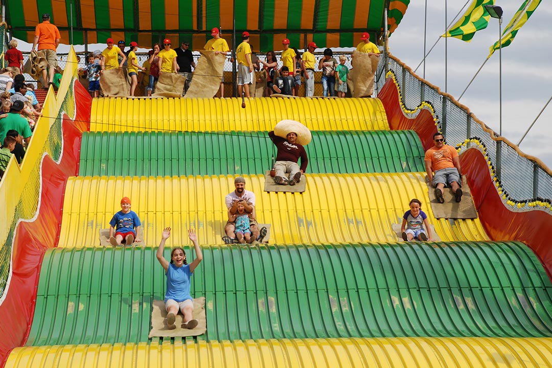 People sliding down the Giant Slide at the Minnesota State Fair.