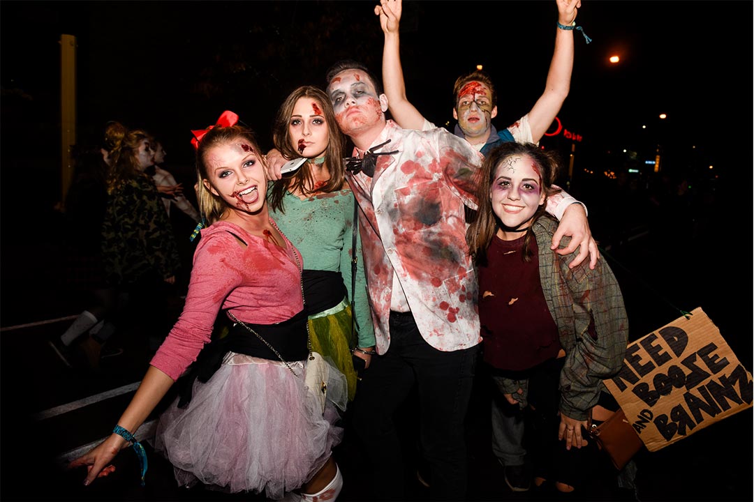 A group of people dressed as zombies at the Zombie Pub Crawl.